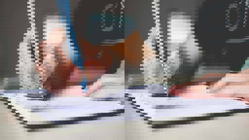 Pexels Writing In Notebook